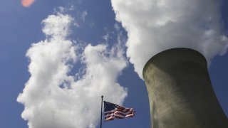 Nuclear Power Plant Structures in Limerick, PA, with American Flagpole in between them.