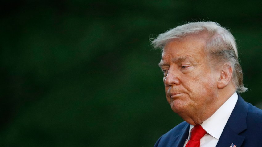 In this Saturday, May 30, 2020, photo, President Donald Trump walks across the South Lawn of the White House in Washington.