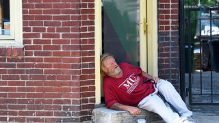 A man sleeps in the shade on July 20, 2019 in Philadelphia, PA