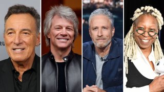 From left to right: Bruce Springsteen, Bon Jovi, Jon Stewart and Whoopi Goldberg
