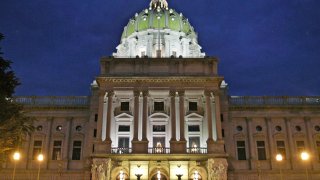 Darkness falls on the Pennsylvania State Capitol Building in Harrisburg, Pennsylvania.