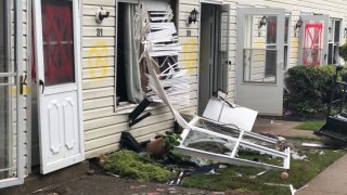 broken windows and debris left by flooding in Bensalem, Bucks County