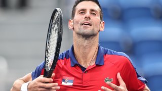 Novak Djokovic of Serbia reacts against Alejandro Davidovich Fokina of Spain during the Men's Singles Third Round Tennis Match on day five of the Tokyo 2020 Olympic Games at Ariake Tennis Park on July 28, 2021 in Tokyo, Japan.