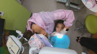 Boy gets a dental exam