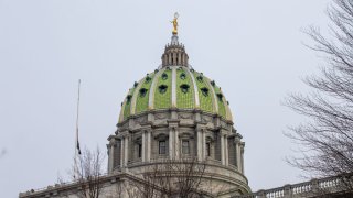 The dome of the Pennsylvania State Capitol is seen in
