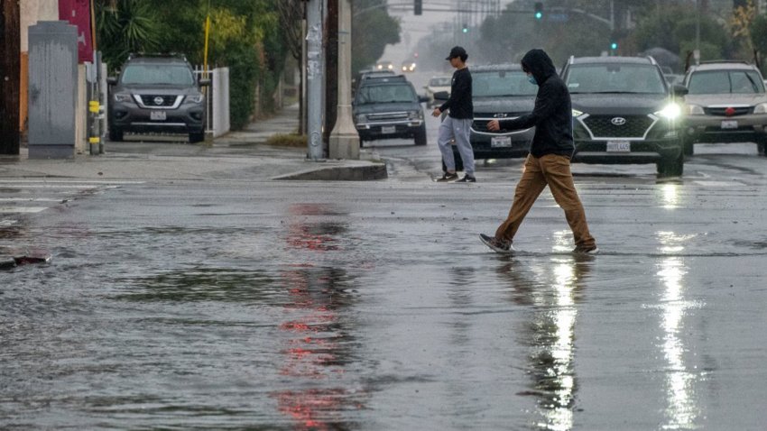 A pedestrian makes his way along Van Nuys Blvd at Arleta Ave in Arleta, Thursday, Dec 23, 2021.