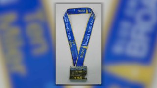 2022 Blue Cross Broad Street Run medal on a background