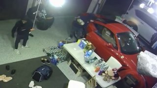 thieves stealing Ferrari inside garage