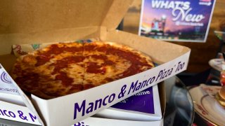 Manco $ Manco pizza in a box