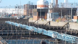 This Jan. 11, 2022 file photo, shows part of the Passaic Valley Sewerage Authority plant in Newark N.J. A proposed backup power plant for the facility is drawing strenuous opposition from residents who say their neighborhood is already overburdened with polluting facilities, including two other power plants