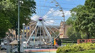 A large ferris wheel up in the middle of eakins oval