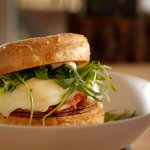 Sandwich with Taylor pork roll, fried egg, kimchee, arugula, and english muffin