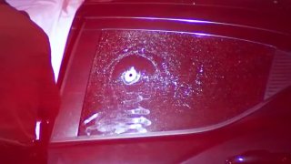 Bullet hole in car window