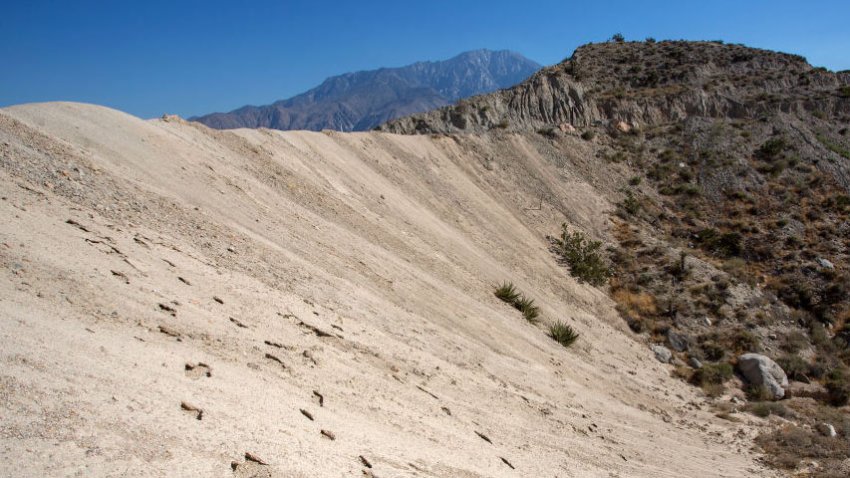 PALM SPRINGS, CA – JUNE 17: Desert bighorn sheep tracks are seen on a hillside along the San Andreas Fault on June 17, 2017 near Palm Springs, California. An earthquake early warning system, under development by U.S. Geological Survey in partnership with several major universities to give the public in California, Oregon and Washington critical seconds of notice to move or duck for cover before a major earthquake hits, may abruptly end with a Trump proposal to cut all funding for it in the upcoming budget. If federal support is allowed to continue, a version of the $38.3 million ShakeAlert system would begin before the end of 2018. The annual cost to operate system for the West Coast would be $16.1 million. Scientists maintain that a massive quake on the southern portion of the San Andreas Fault in the range of 7.8 magnitude is inevitable and long overdue, and will cause widespread devastation in Southern California. (Photo by David McNew/Getty Images)