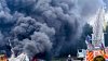 Incendio se devora vehículos en un lote de un negocio comercial en Camden