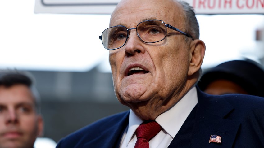 WASHINGTON, DC – DECEMBER 15: Rudy Giuliani, the former personal lawyer for former U.S. President Donald Trump, speaks with reporters outside of the E. Barrett Prettyman U.S. District Courthouse after a verdict was reached in his defamation jury trial on December 15, 2023 in Washington, DC. A jury has ordered Giuliani to pay $148 million in damages to Fulton County election workers Ruby Freeman and Shaye Moss. (Photo by Anna Moneymaker/Getty Images)