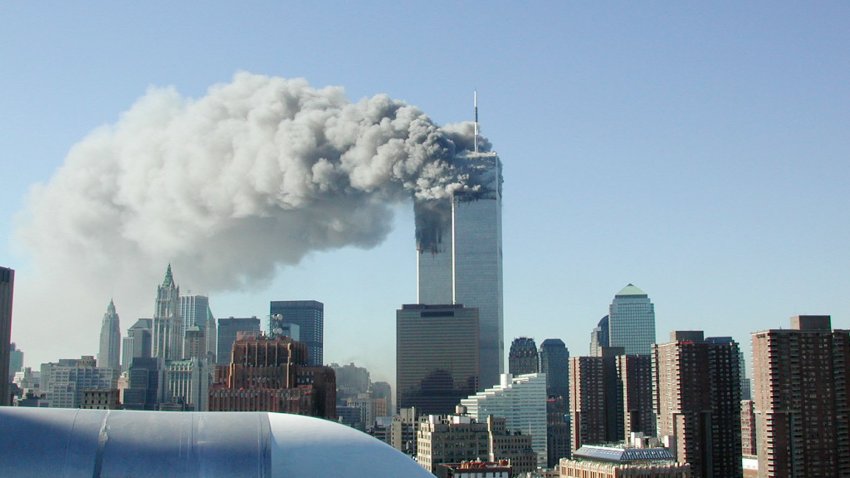 Smoke pours from the World Trade Center after being hit by two planes September 11, 2001 in New York City.