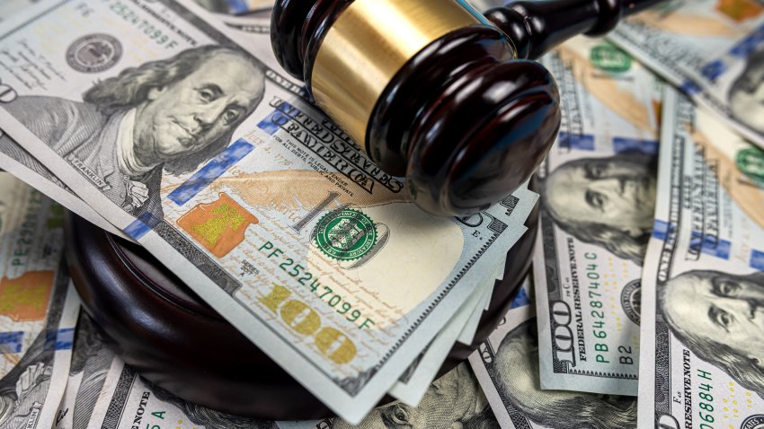 Gavel cash dollar bills and financial crimes. Justice on dollar bills and legal concept