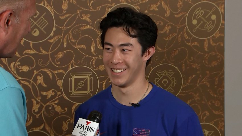 Nathan Chen speaks to reporters in Paris