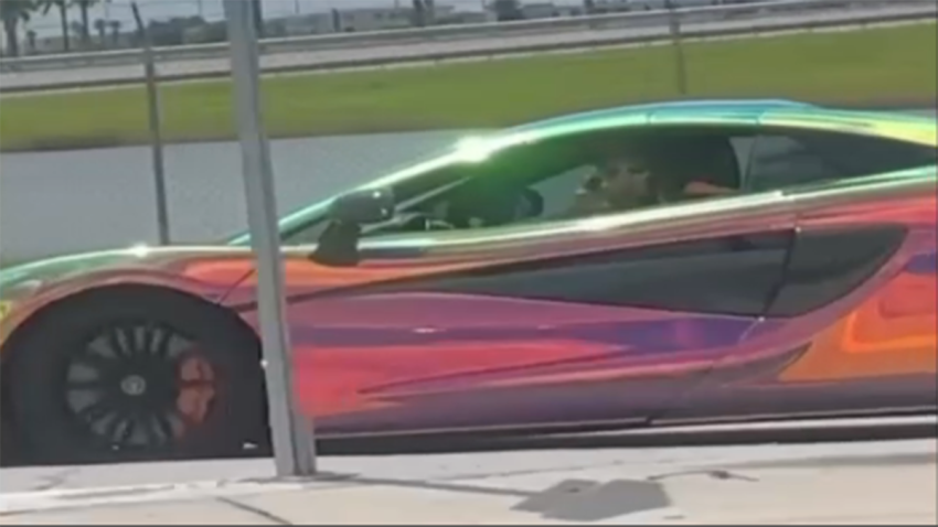 Cuban singer Ovi is facing charges after police said he was caught on video pointing a gun at another driver from inside his McLaren in Miami.