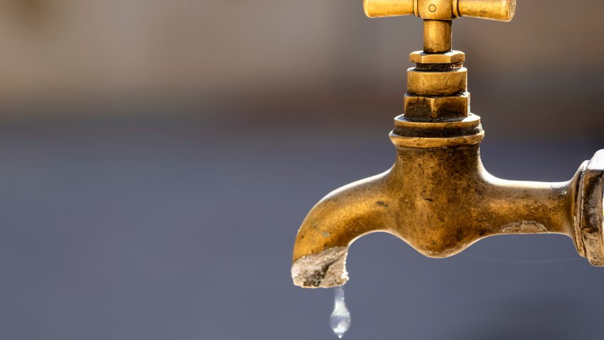 Public outdoor fountain with a tap to save and not waste water. City of Bocairent, province of Valencia, Valencian Community, Spain, Europe.