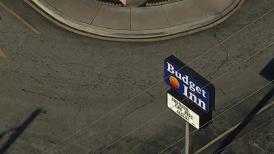 Hallan hombre muerto en estacionamiento de motel