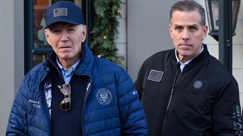 A November 29, 2024 photo shows US President Joe Biden and son Hunter Biden stepping out of a bookstore while shopping in Nantucket, Massachusetts on November 29, 2024. Biden on Sunday issued an official pardon for his son Hunter, who is facing sentencing for two criminal cases related to tax evasion and the purchase of a firearm. (Photo by Mandel NGAN / AFP) (Photo by MANDEL NGAN/AFP via Getty Images)