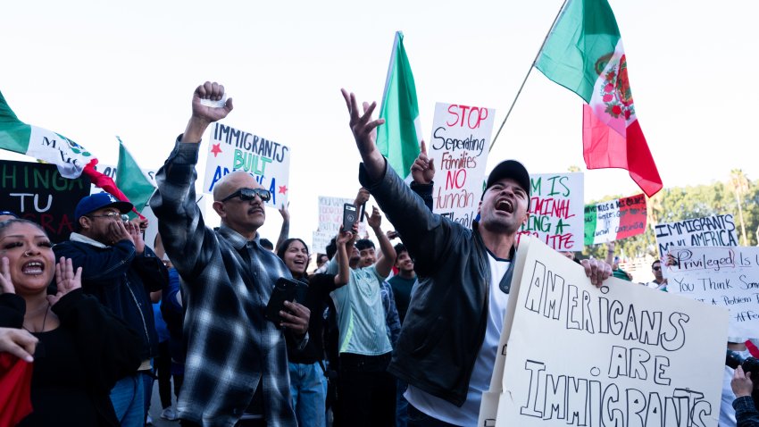 LOS ANGELES, CA – FEBRUARY 02: Protestors wave national flags of Mexico and hold placards during a rally in support of immigrants in response to the Trump administration’s new policies on February 2, 2025 in Los Angeles, California. Thousands of demonstrators rallied in downtown Los Angeles on Sunday to protest President Trump’s crackdown on illegal immigration and his aggressive deportation policies. (Photo by Qian Weizhong/VCG via Getty Images)