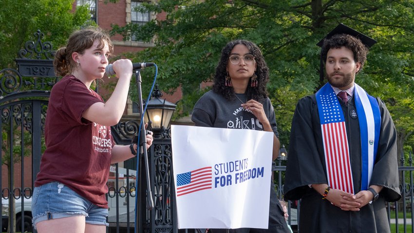 (L/R) Harvard student Rae Trainer speaks alongside fellow students Avinashi Bhandari and Victor Flores during the Harvard Students for Freedom rally in support of international students at the Harvard University campus in Boston, Massachusetts, on May 27, 2025. Harvard students protested Tuesday after the US government said it intends to cancel all remaining financial contracts with the university, President Donald Trump’s latest attempt to force the prestigious institution to submit to unprecedented oversight. (Photo by Rick Friedman / AFP) (Photo by RICK FRIEDMAN/AFP via Getty Images)