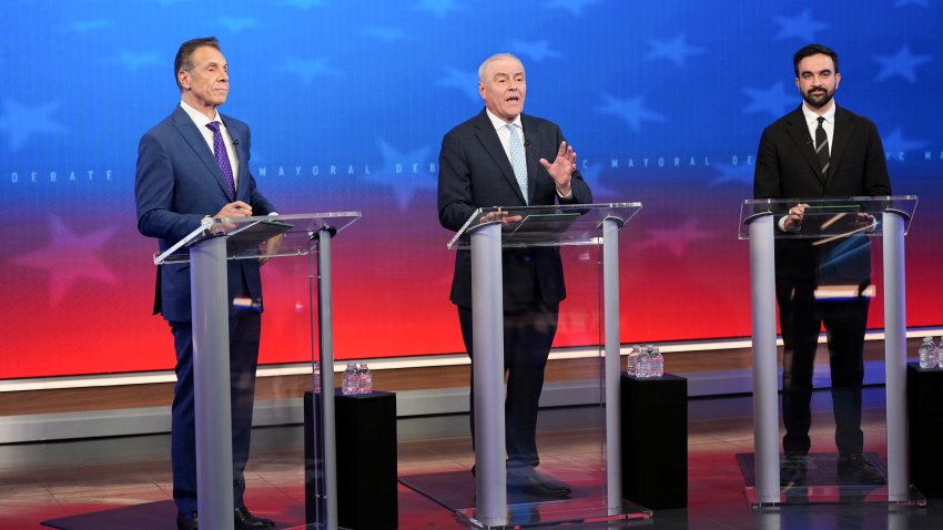 NEW YORK, NY – OCTOBER 16: Republican nominee Curtis Sliwa (C) speaks alongside Independent nominee former, New York Gov. Andrew Cuomo (L) and Democratic nominee Zohran Mamdani during a mayoral debate at Rockefeller Center on October 16, 2025 in New York City. The candidates for New York City mayor are facing off in their first debate ahead of the November 4 election. (Photo by Angelina Katsanis-Pool/Getty Images)