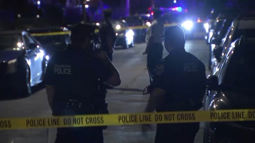 Police at the scene after a man was shot along Louise Street in Philly's West Oak Lane section on Wednesday night.